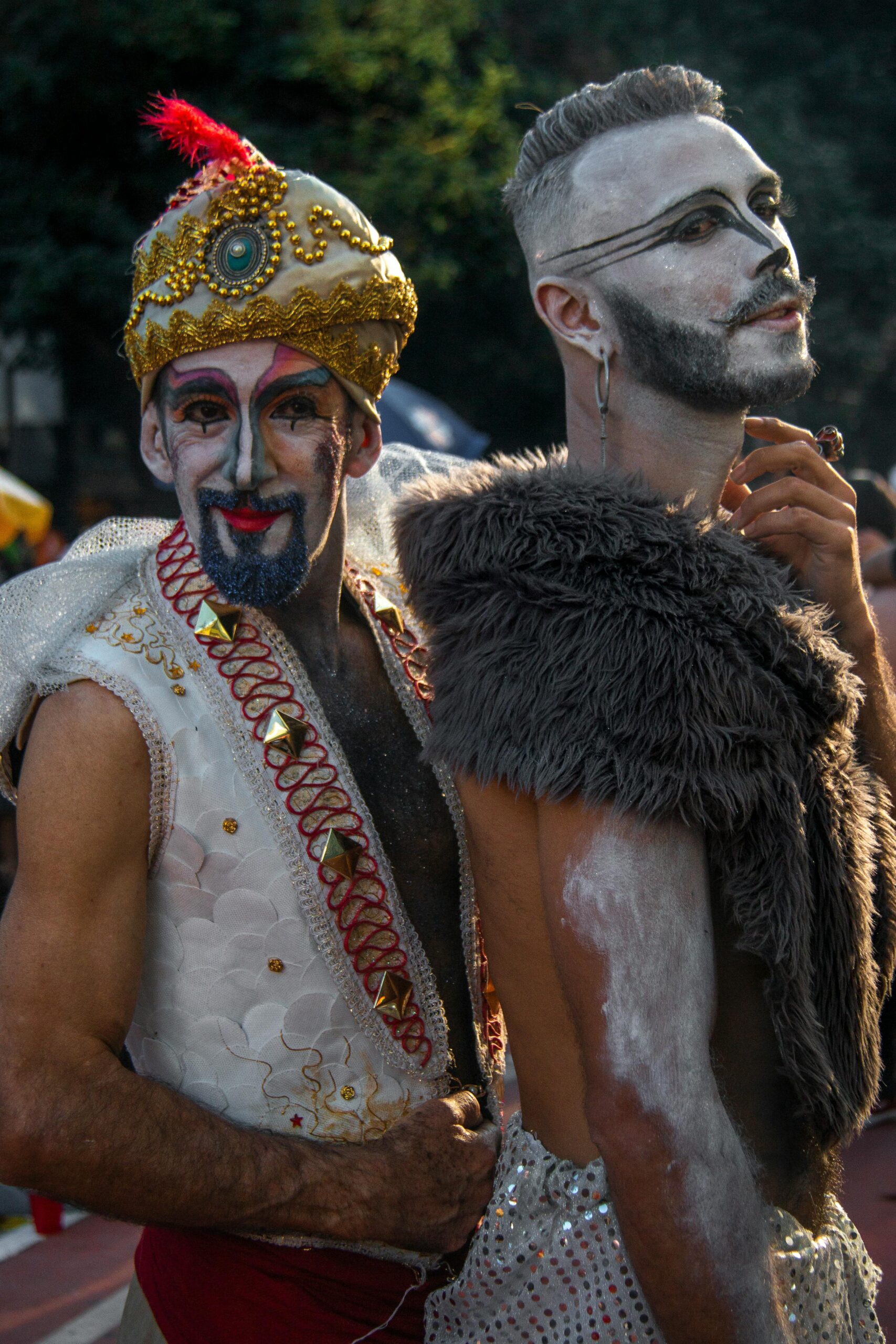 Vibrant costumes and face paint at a pride parade in São Paulo, Brazil enhance the festive atmosphere.